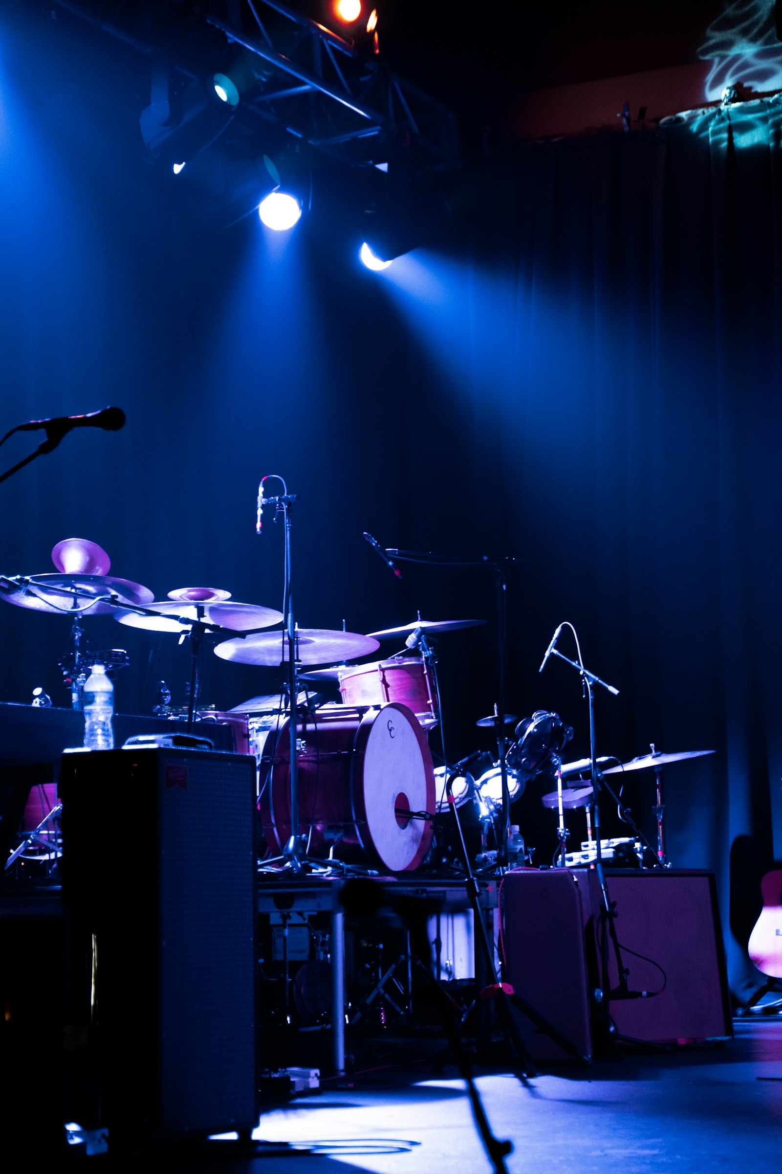 A band on stage — the moments right before fans line up at the merch table.